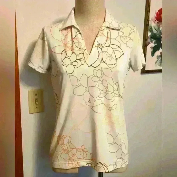 IZOD XFG WOMEN'S WHITE FLORAL GOLF SHIRT. SIZE SMALL. - Picture 1 of 7